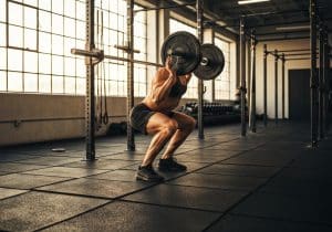 Comment bien faire des squats avec barre